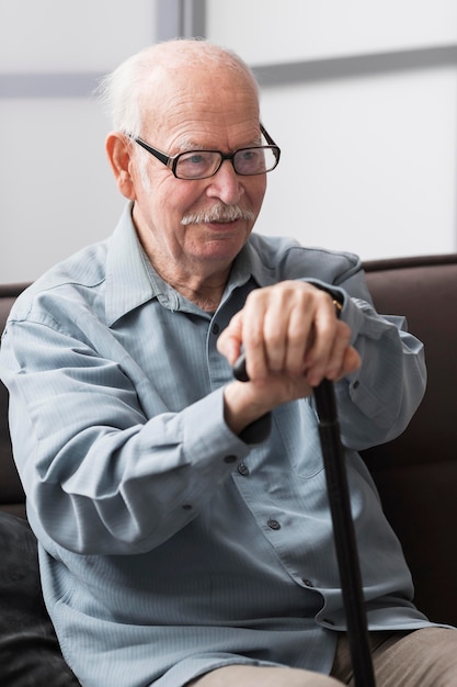 Free photo smiley old man in a nursing home