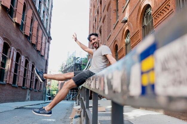 Smiley and playful handsome model outdoor