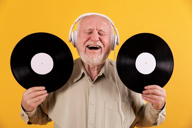 Smiley senior listening music