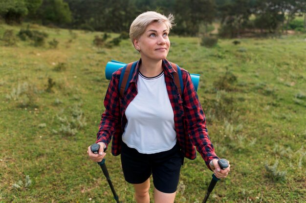 Smiley senior tourist woman outdoors