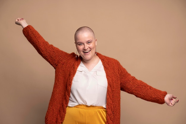 Free photo smiley strong woman fighting breast cancer