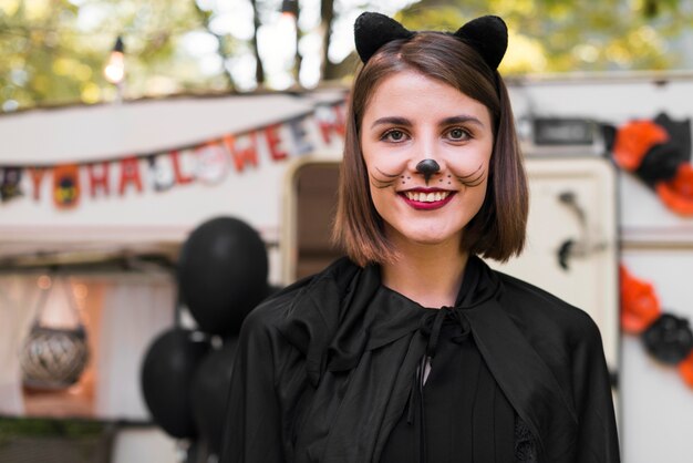 Smiley woman dressed like cat