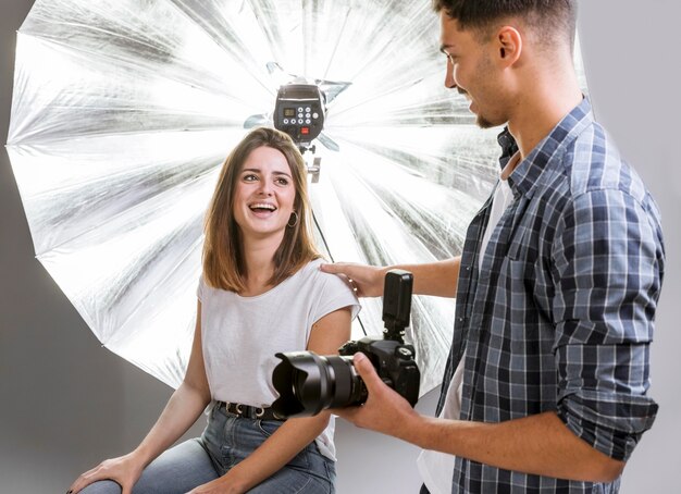 Smiley woman enjoying photo shooting