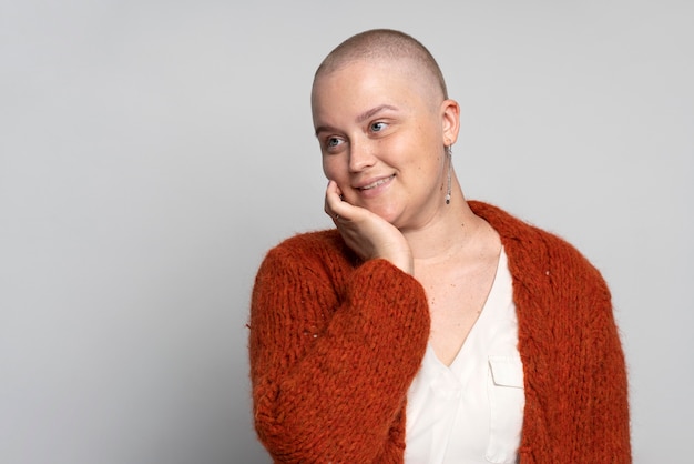 Smiley woman fighting breast cancer