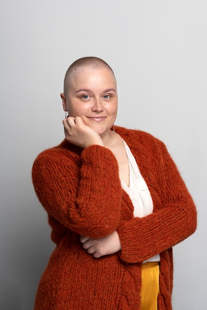 Смайлик женщина борется с раком груди