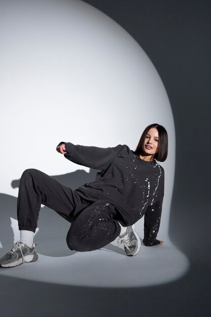 smiley woman moving her body full shot