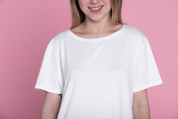 Smiley woman posing with white shirt