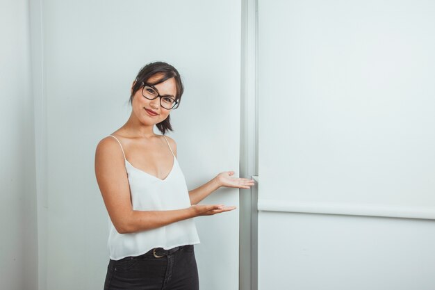 Smiley woman at presentation with a whiteboard