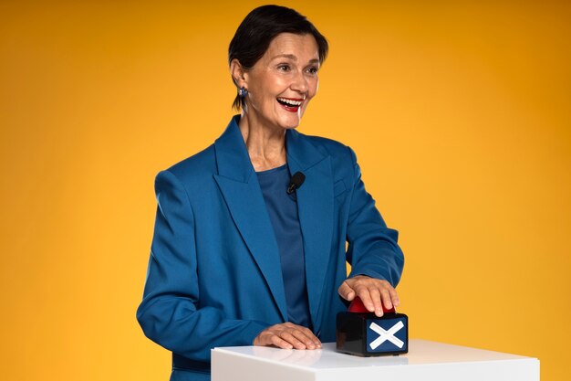 Smiley woman pressing buzzer medium shot