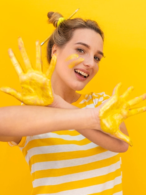 Smiley woman showing her palms