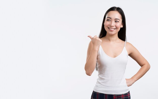 Smiley woman showing ok sign
