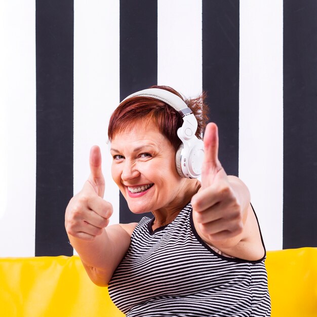 smiley woman showing ok sing