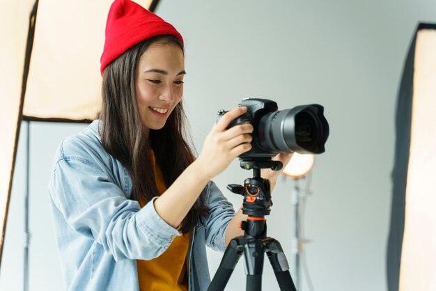 Smiley woman taking photo