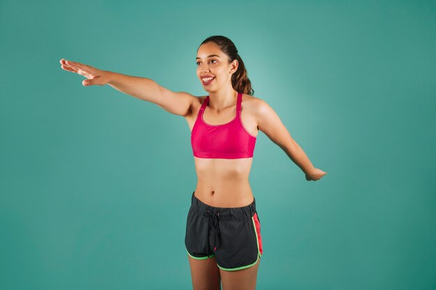 Free photo smiley woman training arms