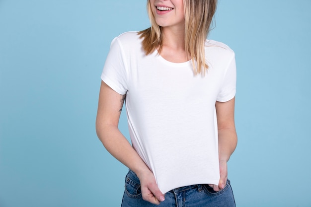 Smiley woman wearing blank shirt