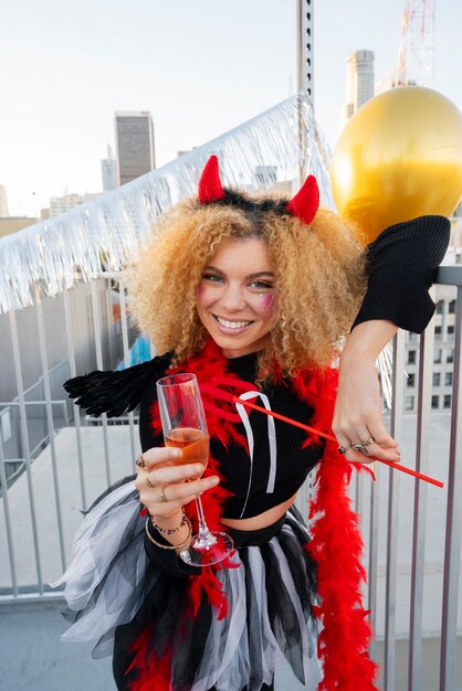 Smiley woman wearing costume medium shot