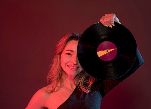 Smiley woman with vinyl
