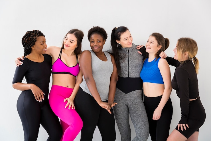Free Photo smiley women on break from fitness class