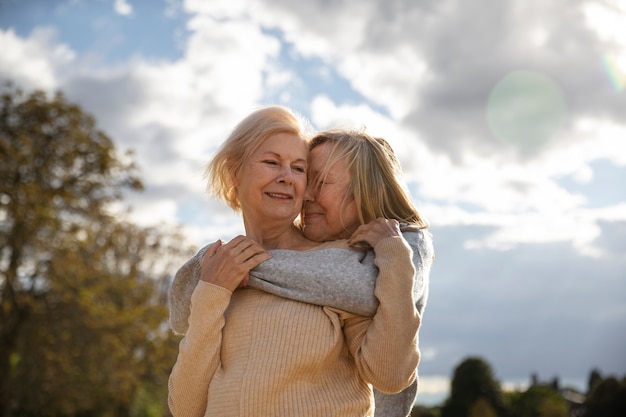 smiley women in nature front view