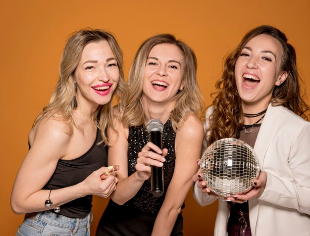 Smiley women singing