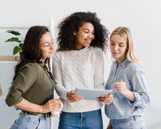 Smiley womens looking on table