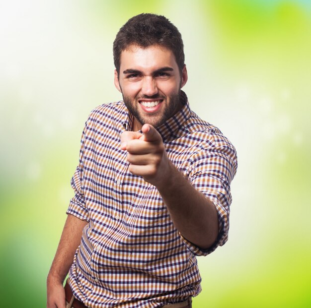 Smiling arabic man pointing to the camera