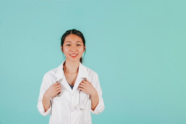 Smiling Asian doctor