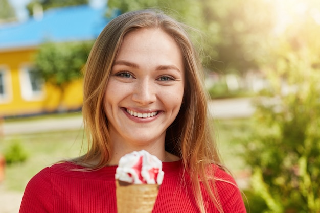 Premium Photo | Smiling attractive young female with dimples on her cheeks  having fun and good mood