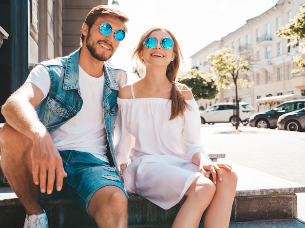 Smiling beautiful girl and her handsome boyfriend. 