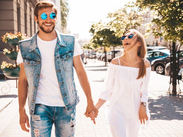 Smiling beautiful girl and her handsome boyfriend.