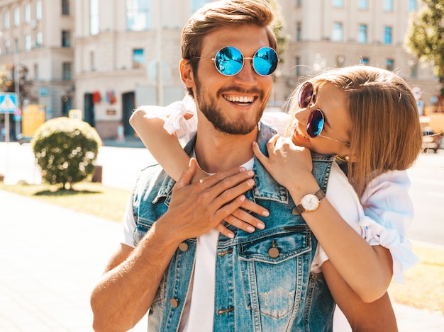 Smiling beautiful girl and her handsome boyfriend.