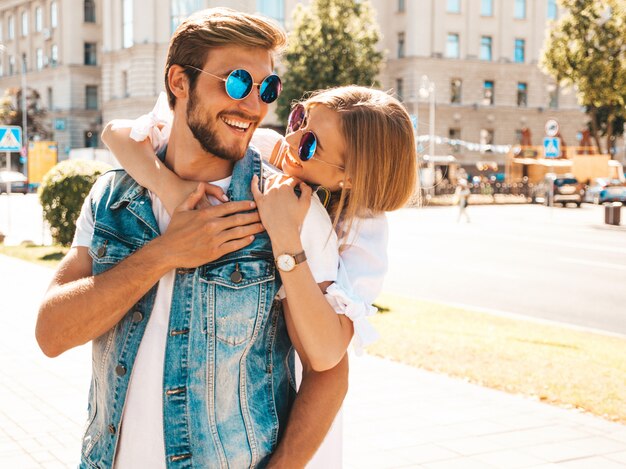 Smiling beautiful girl and her handsome boyfriend. 