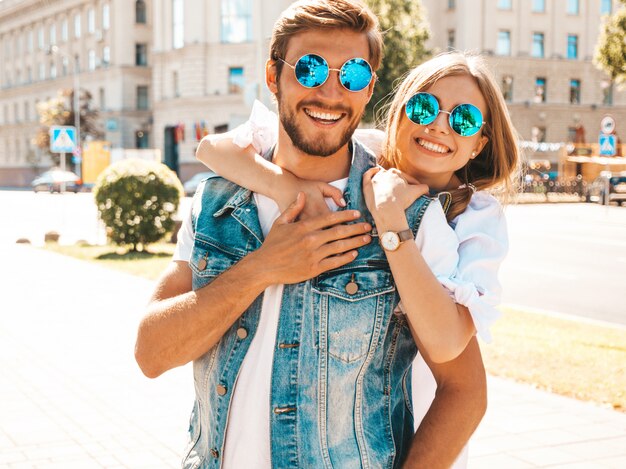 Smiling beautiful girl and her handsome boyfriend.