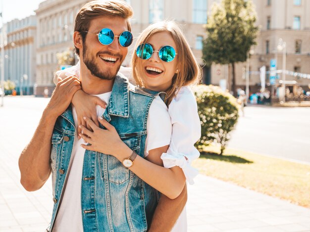 Smiling beautiful girl and her handsome boyfriend. 