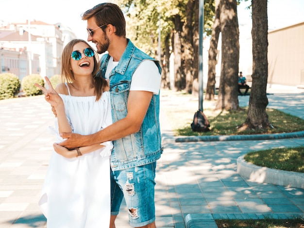 Smiling beautiful girl and her handsome boyfriend