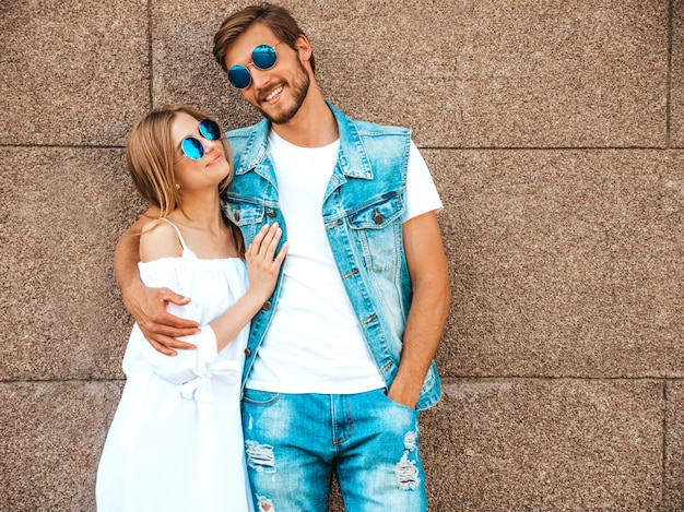 Free photo smiling beautiful girl and her handsome boyfriend.