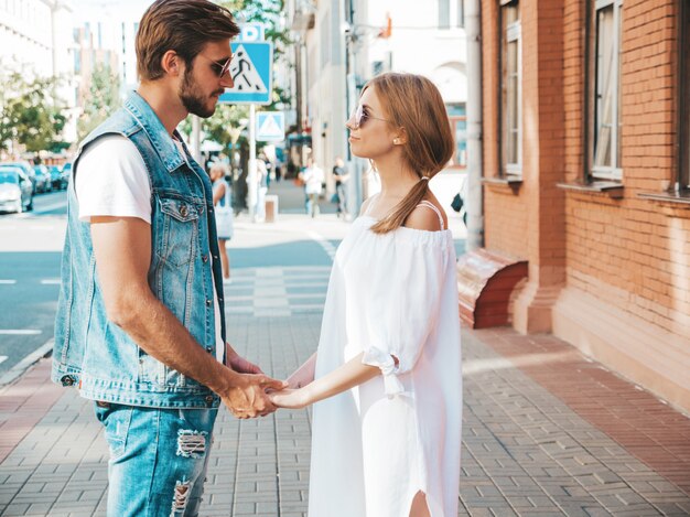 Smiling beautiful girl and her handsome boyfriend.