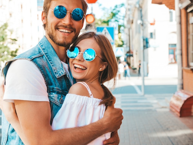 Smiling beautiful girl and her handsome boyfriend. 