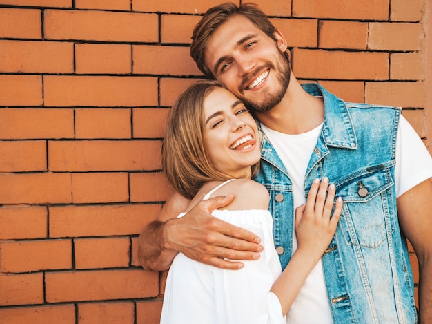 Smiling beautiful girl and her handsome boyfriend.