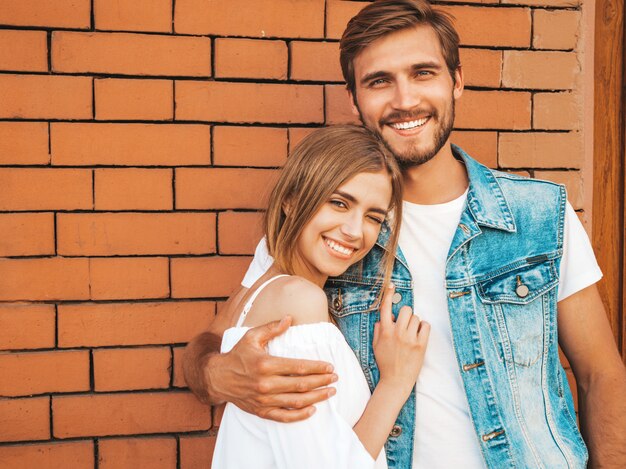 Smiling beautiful girl and her handsome boyfriend. 