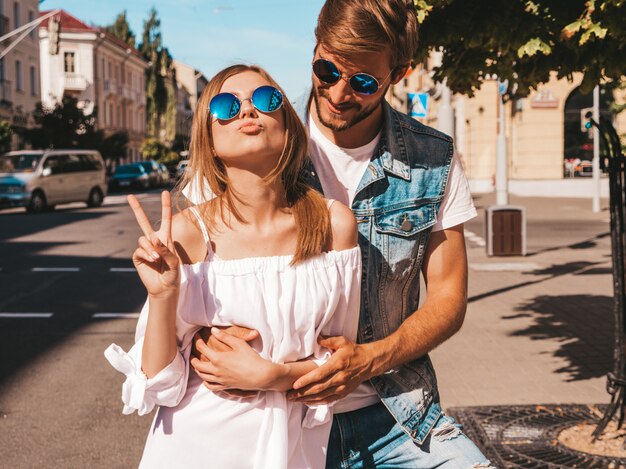 Smiling beautiful girl and her handsome boyfriend.