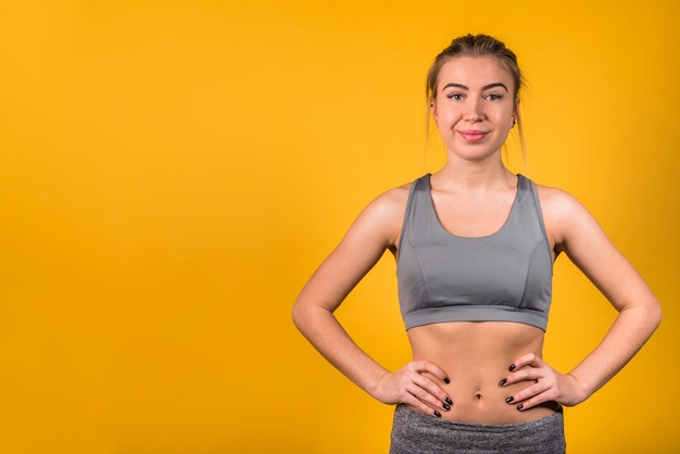 Smiling beautiful woman in sportswear