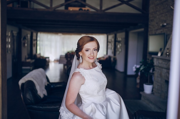 Smiling bride in living room