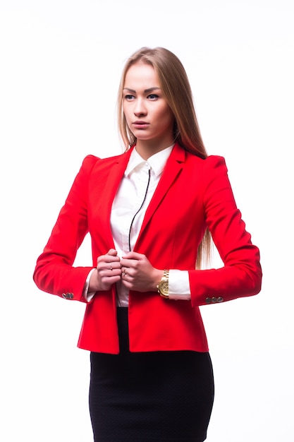 Smiling business woman with folded hands against white wall. Toothy smile, crossed arms.