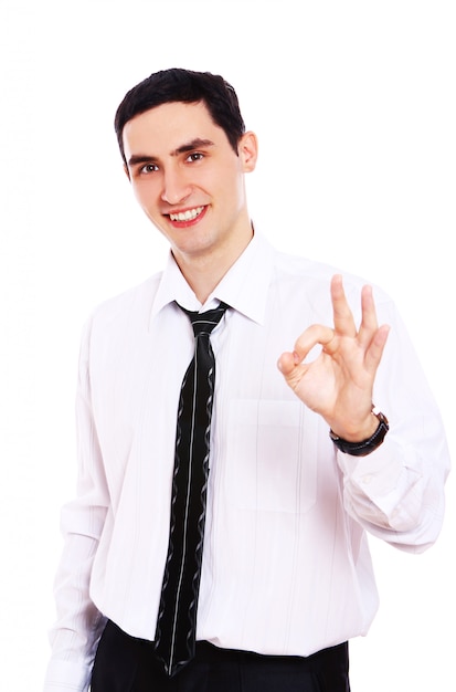 Smiling businessman showing OK sign