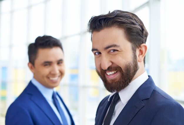 Smiling businessmen in the office