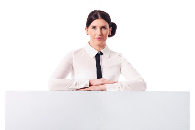 Free photo smiling businesswoman with empty white board