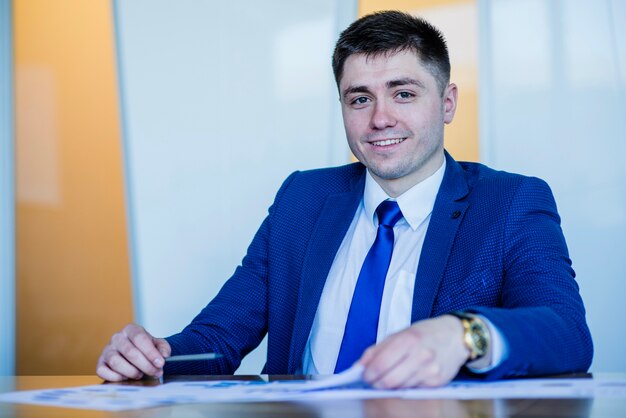 Smiling ceo in blue suit