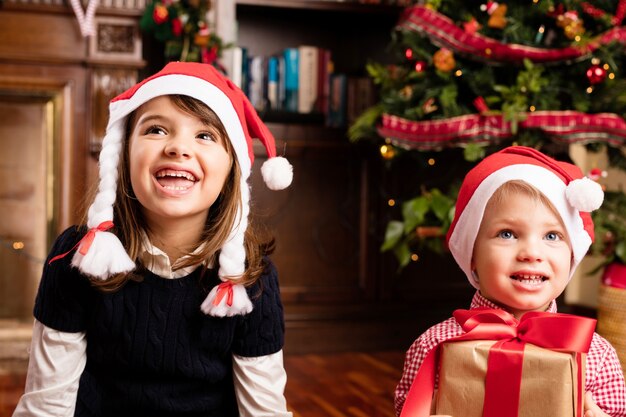 Free photo smiling children with gifts
