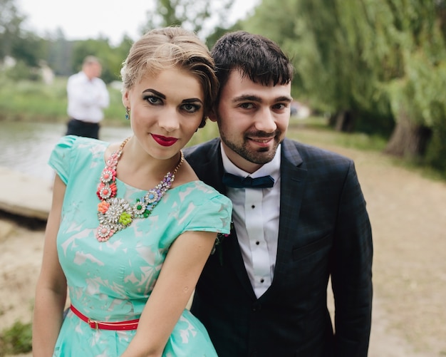 Smiling couple in elegant clothes